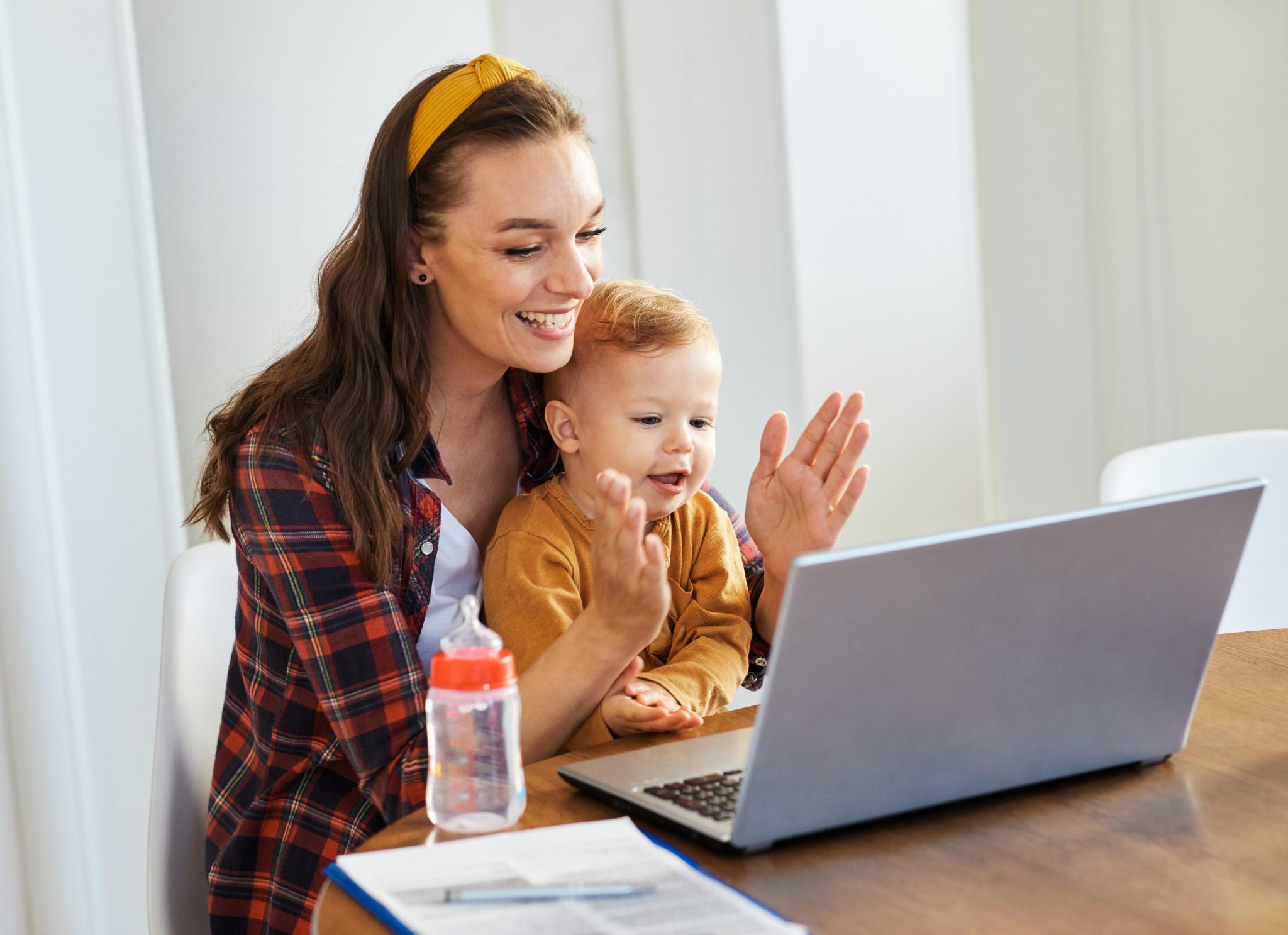 Mother baby laptop computer child woman working bu 2023 11 27 05 35 50 utc