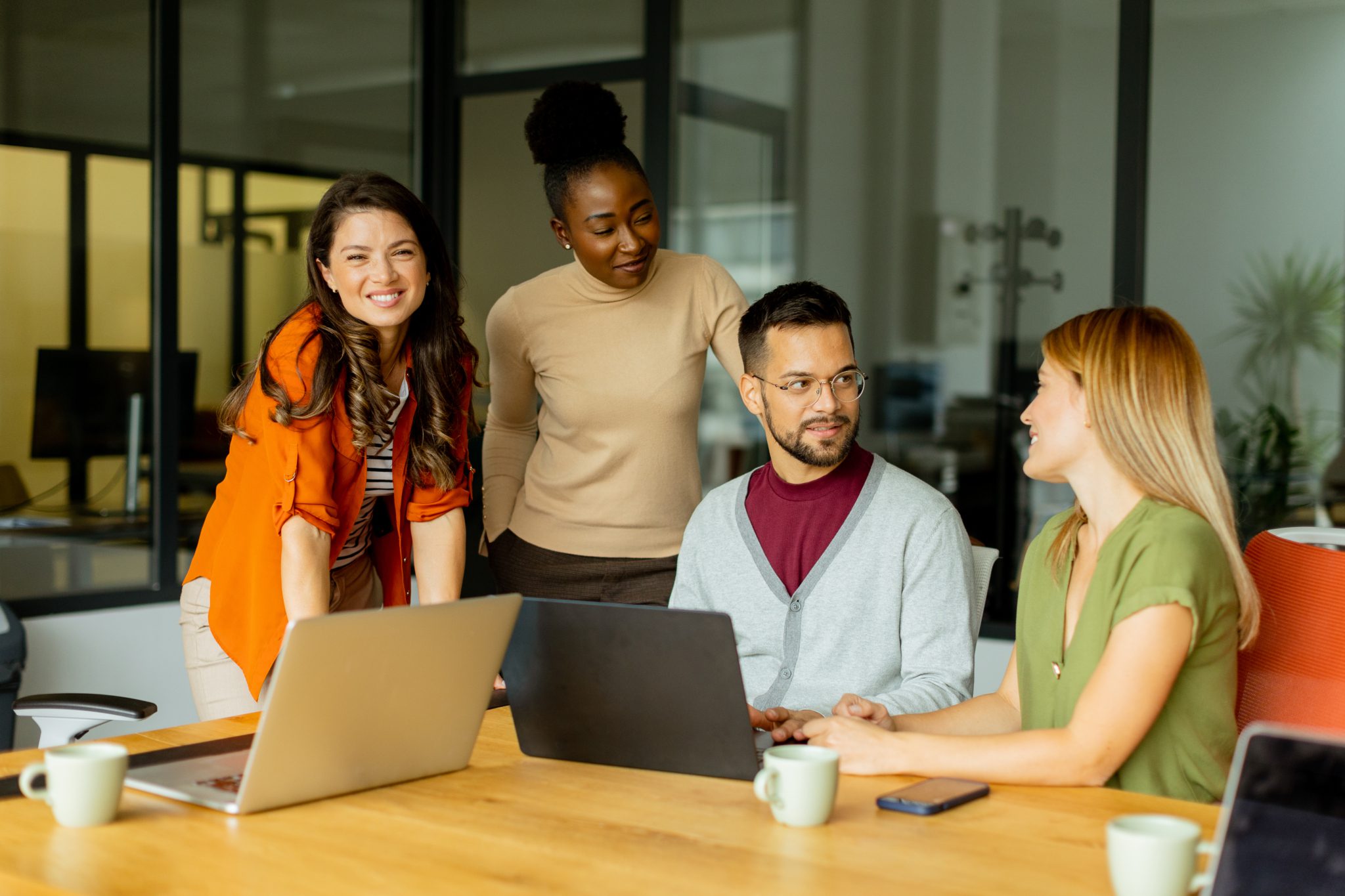 Young multiethnic startup team working in the mode 2023 11 27 05 35 09 utc